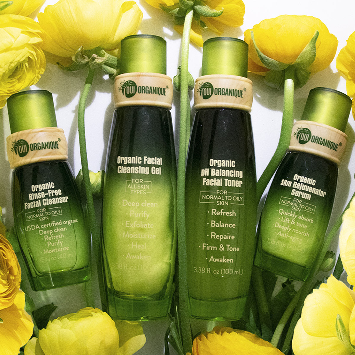 OUI ORGANIQUE green organic facial skincare bottles arranged with yellow flowers natural sunscreen alternative